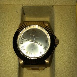 Gold invicta watch